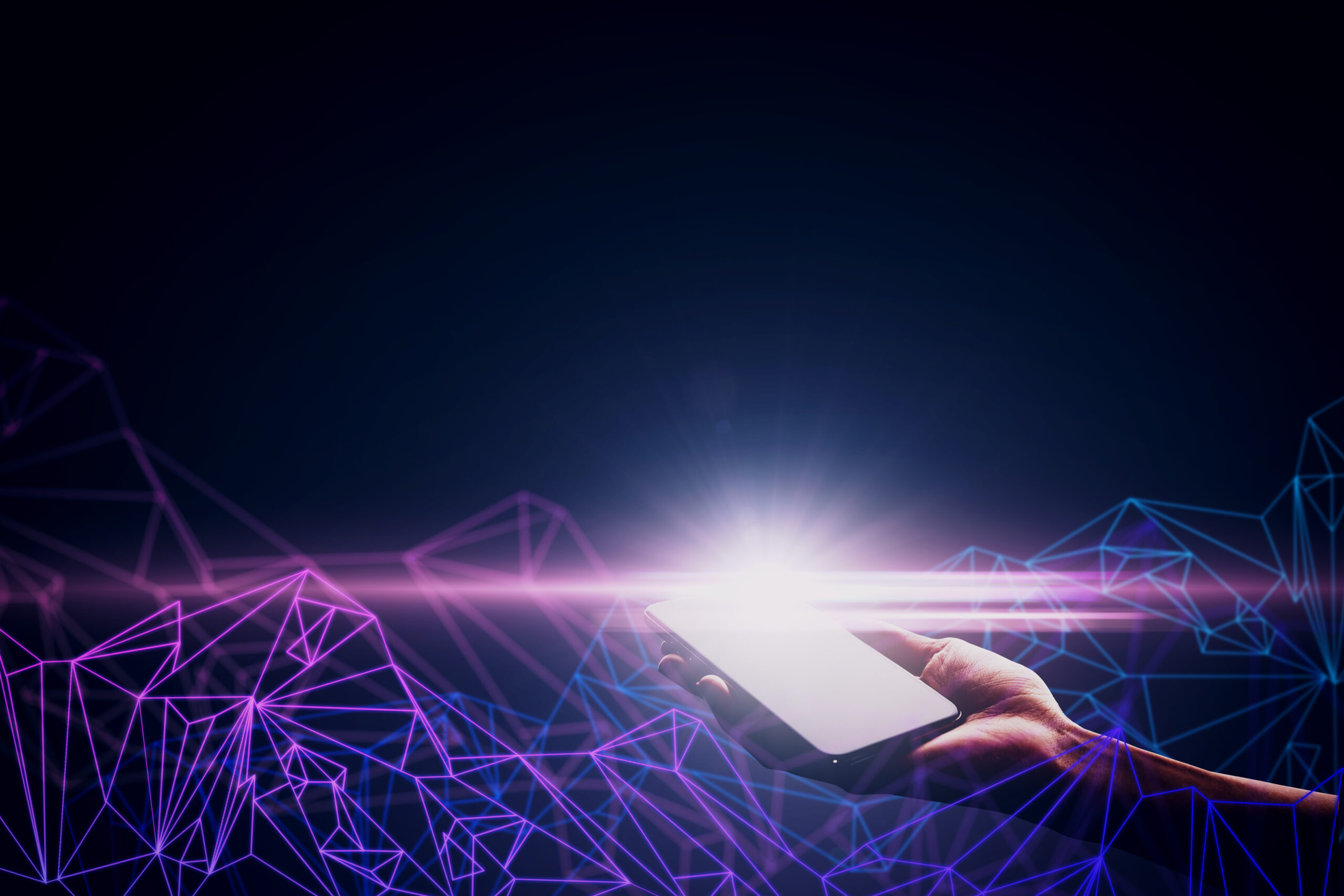 hand-holding-glowing-smartphone